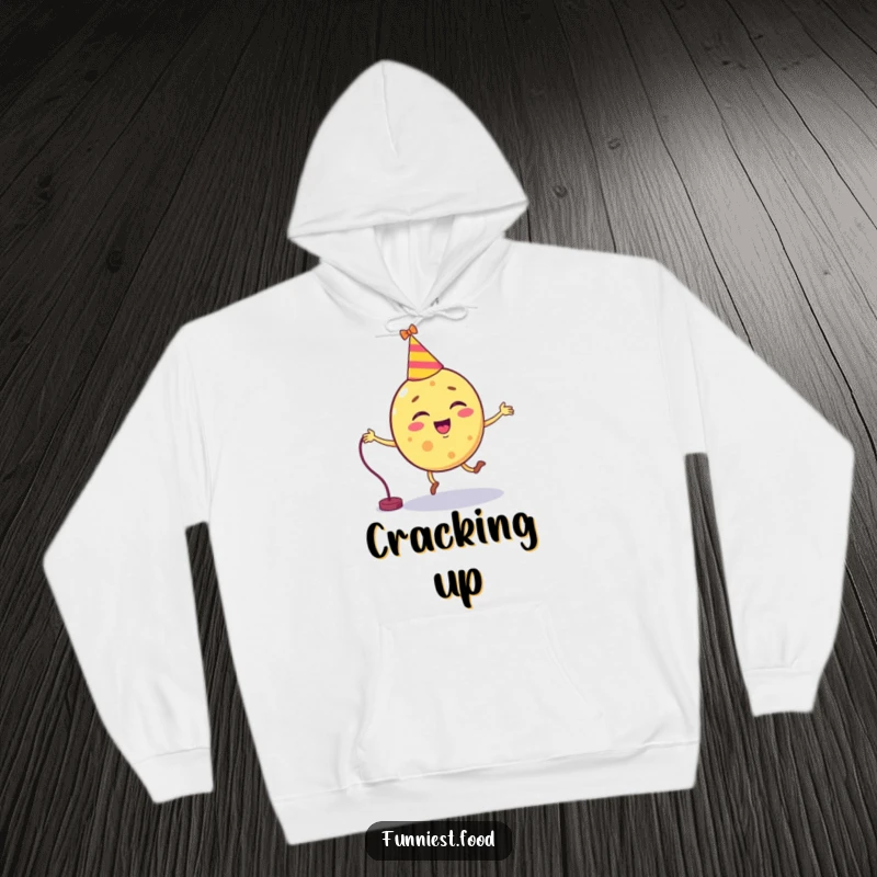 Funny chip character with a party hat attempting to jump rope on a cozy hoodie.