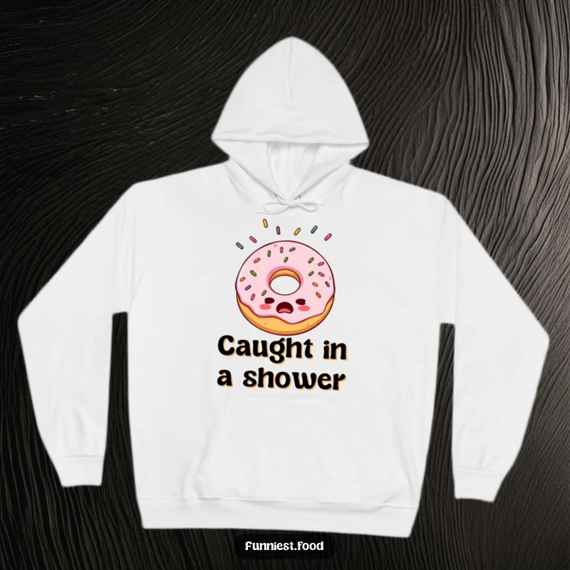 Funny bewildered donut hoodie, looking utterly surprised by a downpour of sprinkles, offering cozy, humorous protection.