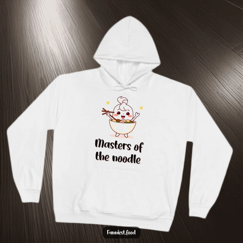 Funny hooded sweatshirt showcasing a happy ramen bowl character adeptly juggling chopsticks, merging comfort and humor.