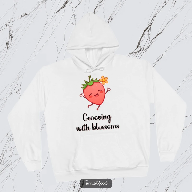 Funny Strawberry Dance Hoodie: A joyful strawberry character dances with a flower, offering ultimate comfort and a heartwarming funny gift.