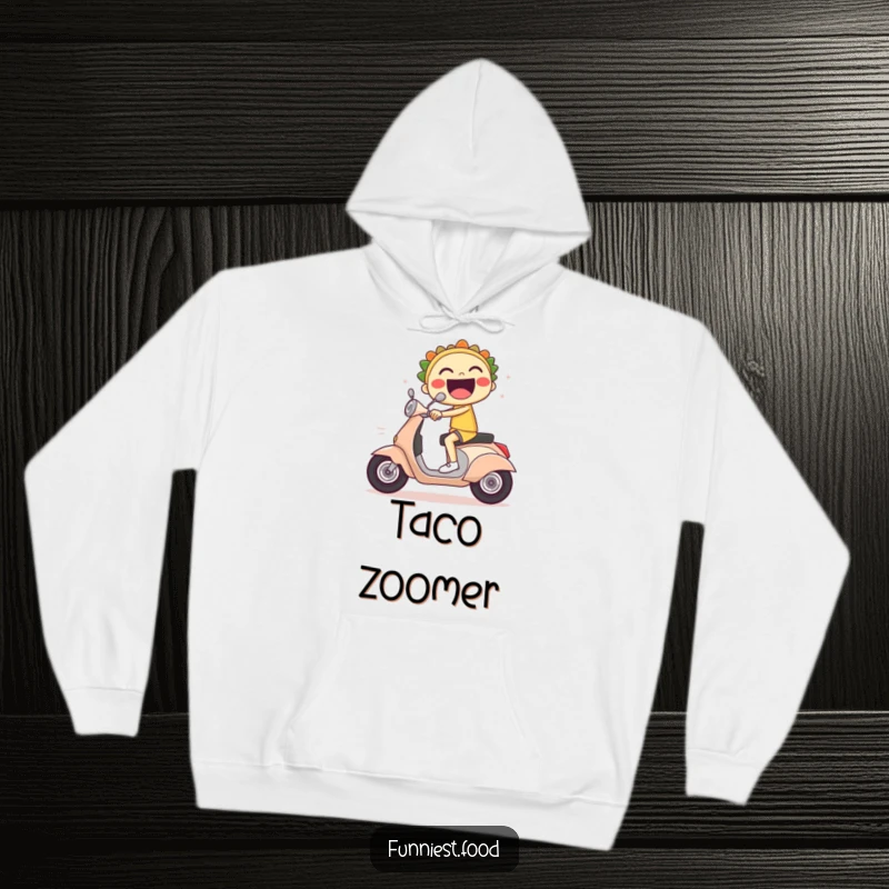 Funny hoodie depicting a laughing taco character on a scooter, leaving a trail of speed lines.