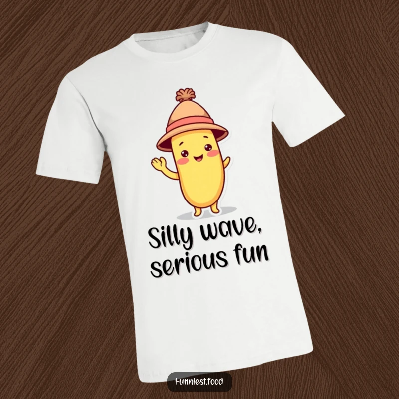 Funny Banana T-Shirt: A whimsical banana character sporting a hat waves playfully, capturing pure silliness.