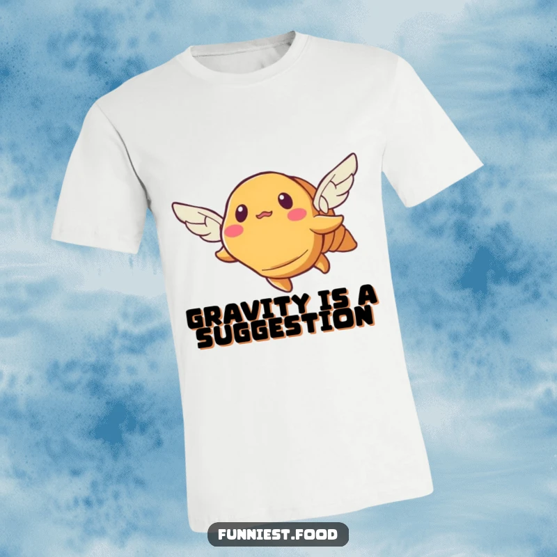 Funny croissant t-shirt featuring a bewildered pastry with small wings attempting to fly, a humorous apparel choice.
