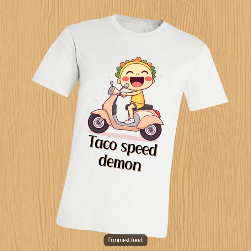 Funny t-shirt with a laughing taco character expertly riding a scooter at high speed.