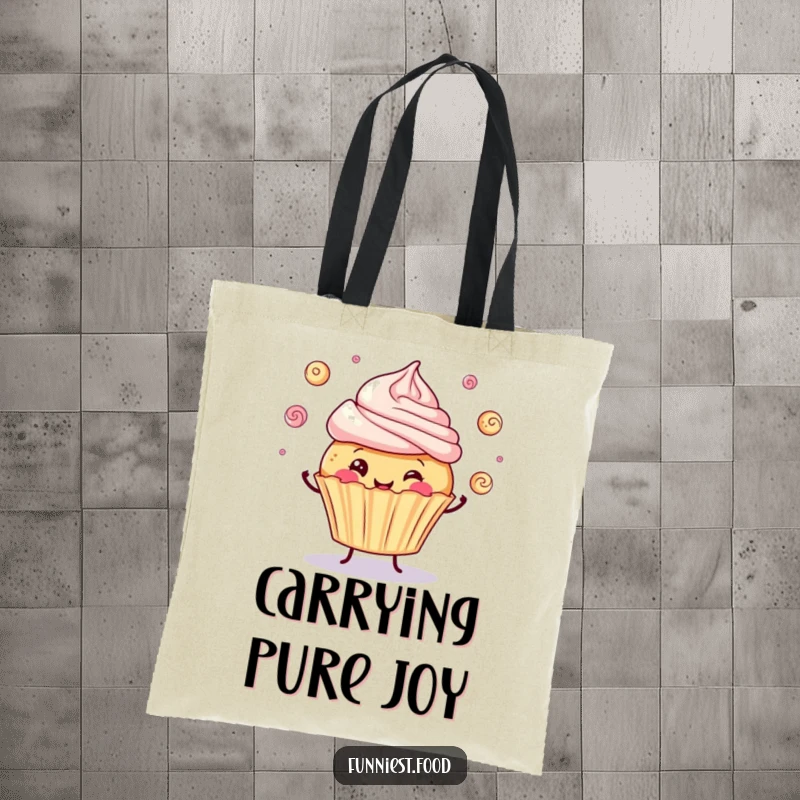 Funny tote bag with a jolly cupcake character juggling frosting swirls, ideal for carrying essentials with a smile.